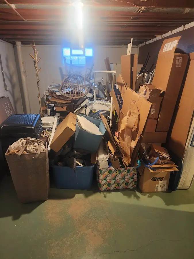 Roll-off dumpster container at job site for 15 Yard Dumpster Rental in Commerce